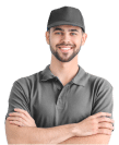 A smiling man wearing a gray shirt and cap, exuding a cheerful and friendly demeanor