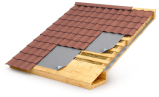 A close-up of a roof featuring metal roofing shingles, highlighting the durability and quality for roof repair needs.