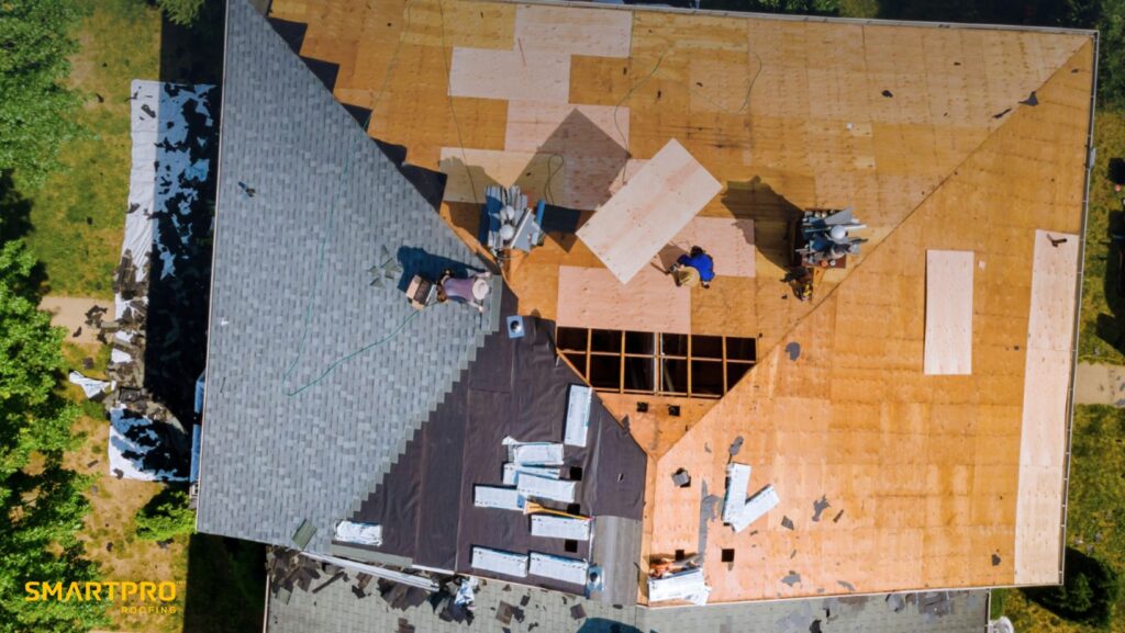 How Long Does It Take to Replace a Roof? A Complete Guide 11 Aerial perspective of a roof installation in progress