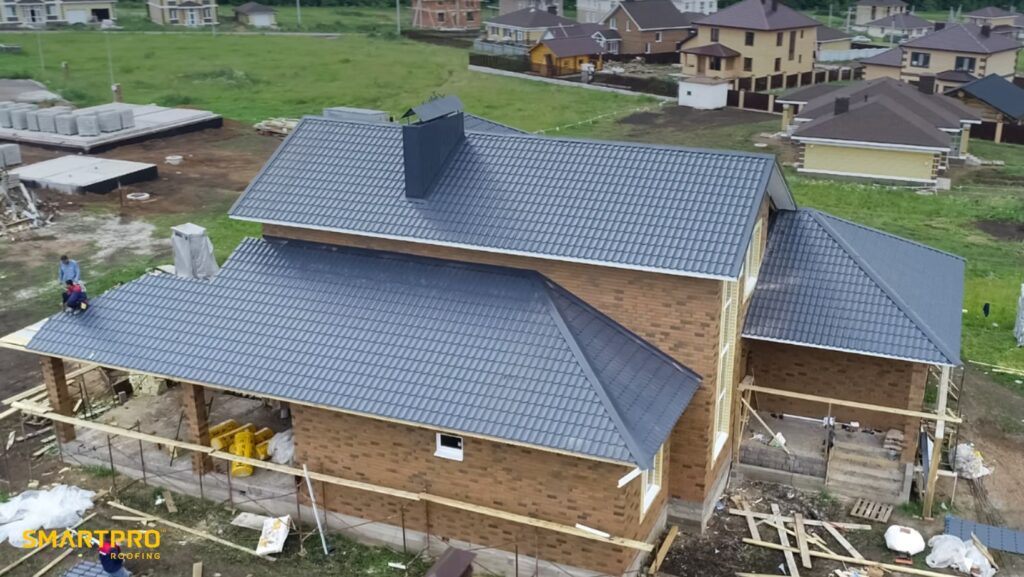 A house under construction featuring a metal roof