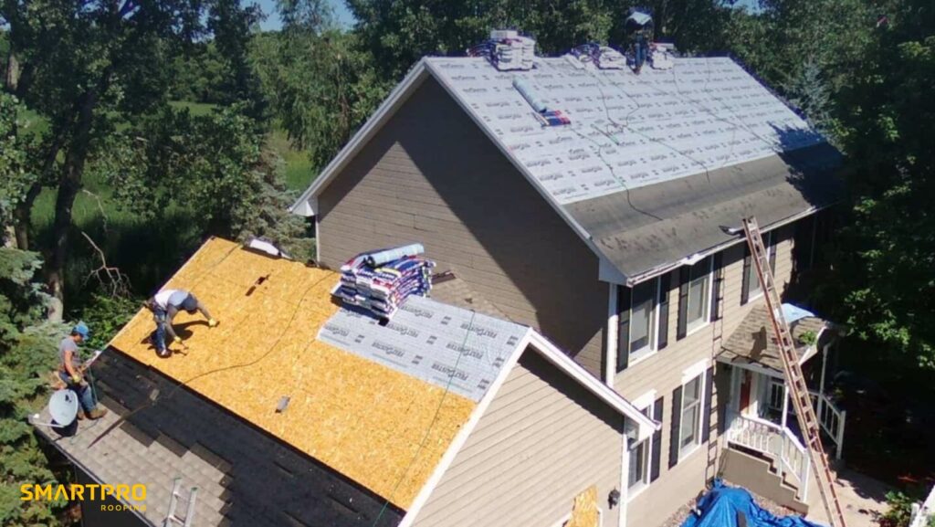 A group of roofing contractors discussing a project