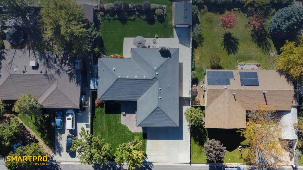 Top-down perspective of a house with solar panels on the roof