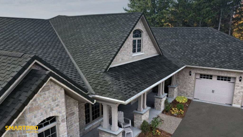  A house featuring a black roof complemented by gray shingles