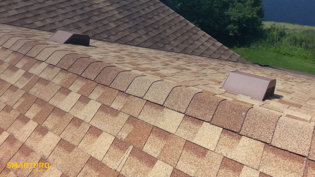 A close-up of a brown shingled roof