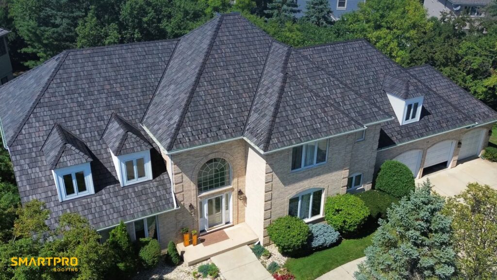 A large home featuring a traditional shingled roof