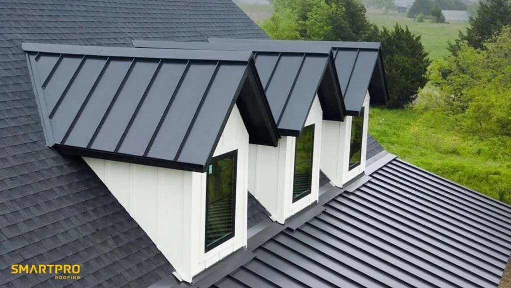 A sleek black metal roof with three windows