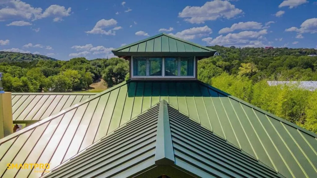 A green metal roof featuring a window at the top