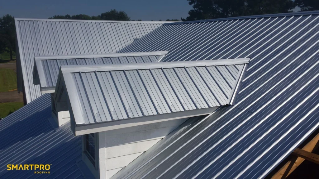 Metal Roof Color Choices: Which Reflect Heat Best? 10 A metal roof with a visible logo of a metal roofing company