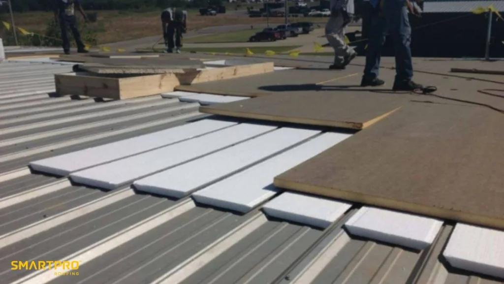 How Metal Roof Coatings Extend Lifespan in Florida Weather 12 A man is on a metal roof