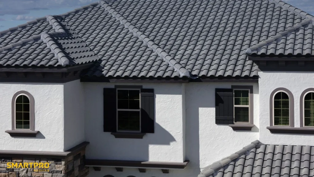 Metal Roof ROI: Clay vs. Concrete Tiles: Which Lasts Longer in Florida Homes? 11 A house featuring a white roof and gray tile