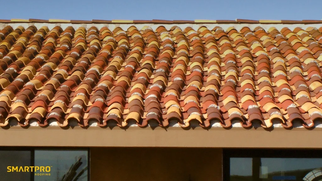 Close-up of a roof featuring an array of colorful tiles in various shades and patterns.