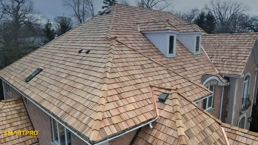 A roof covered with wooden shingles, showcasing a natural and rustic architectural style.